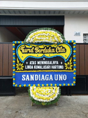 Papan Bunga Duka di Ledeng